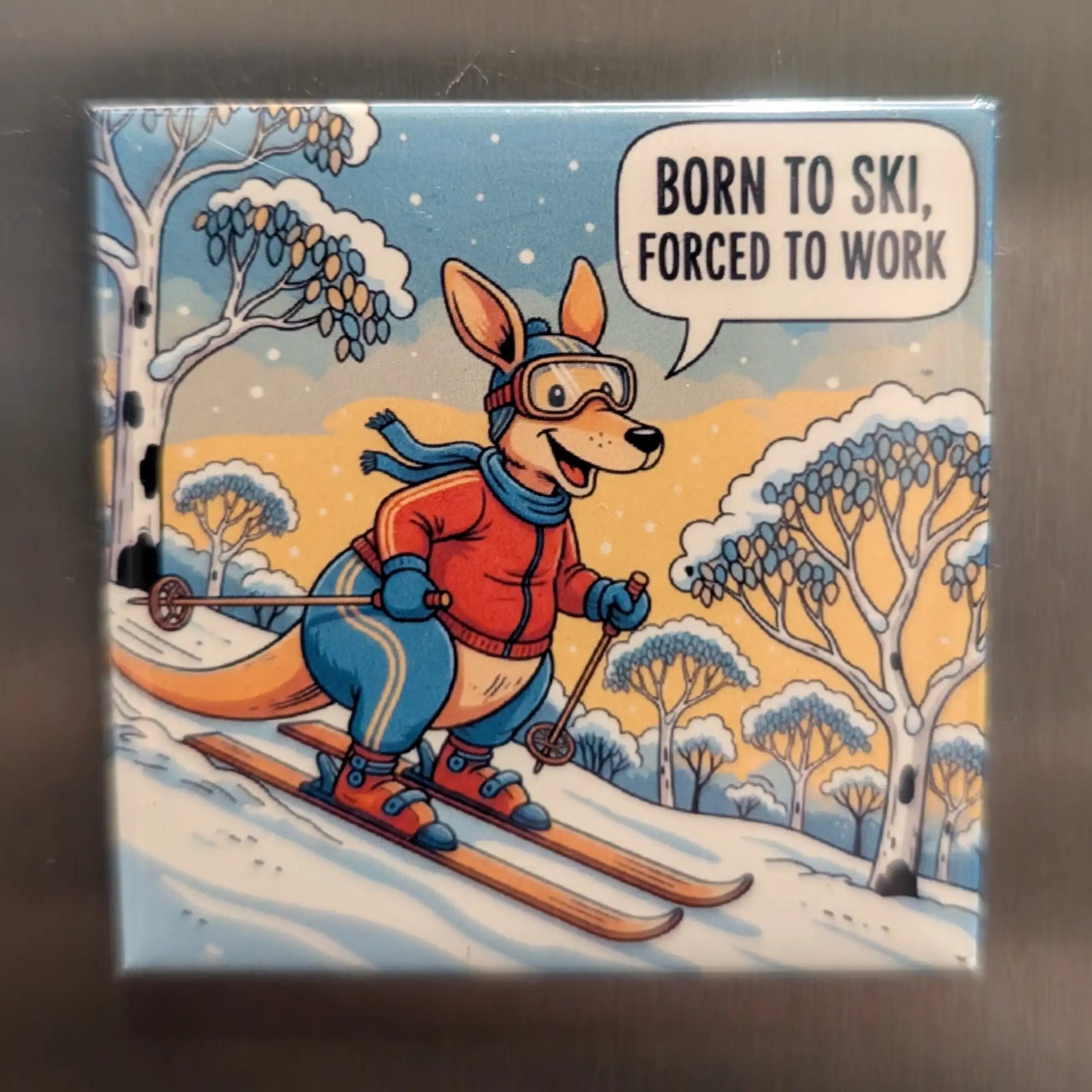 Cartoon fox skiing with text 'Born to ski, forced to work' on a snowy background